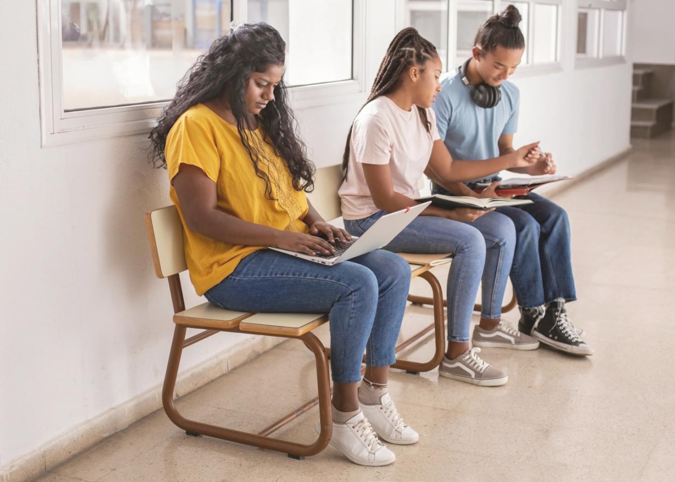 Startup founder reviewing financial projections and business metrics on laptop